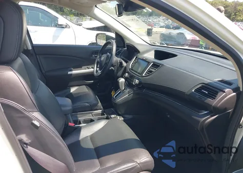 2015 Honda Cr-V Touring z USA, uszkodzony, nr VIN 5J6RM4H92FL116338